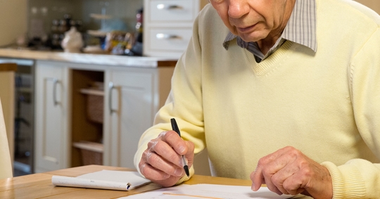 person looking over probate documents