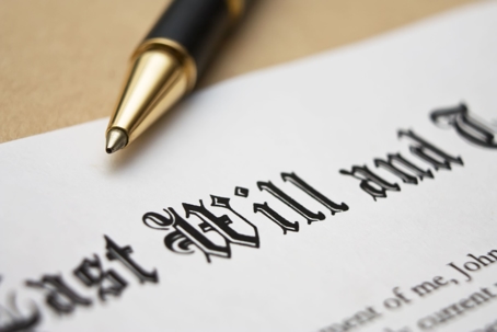pen with last will and testament document